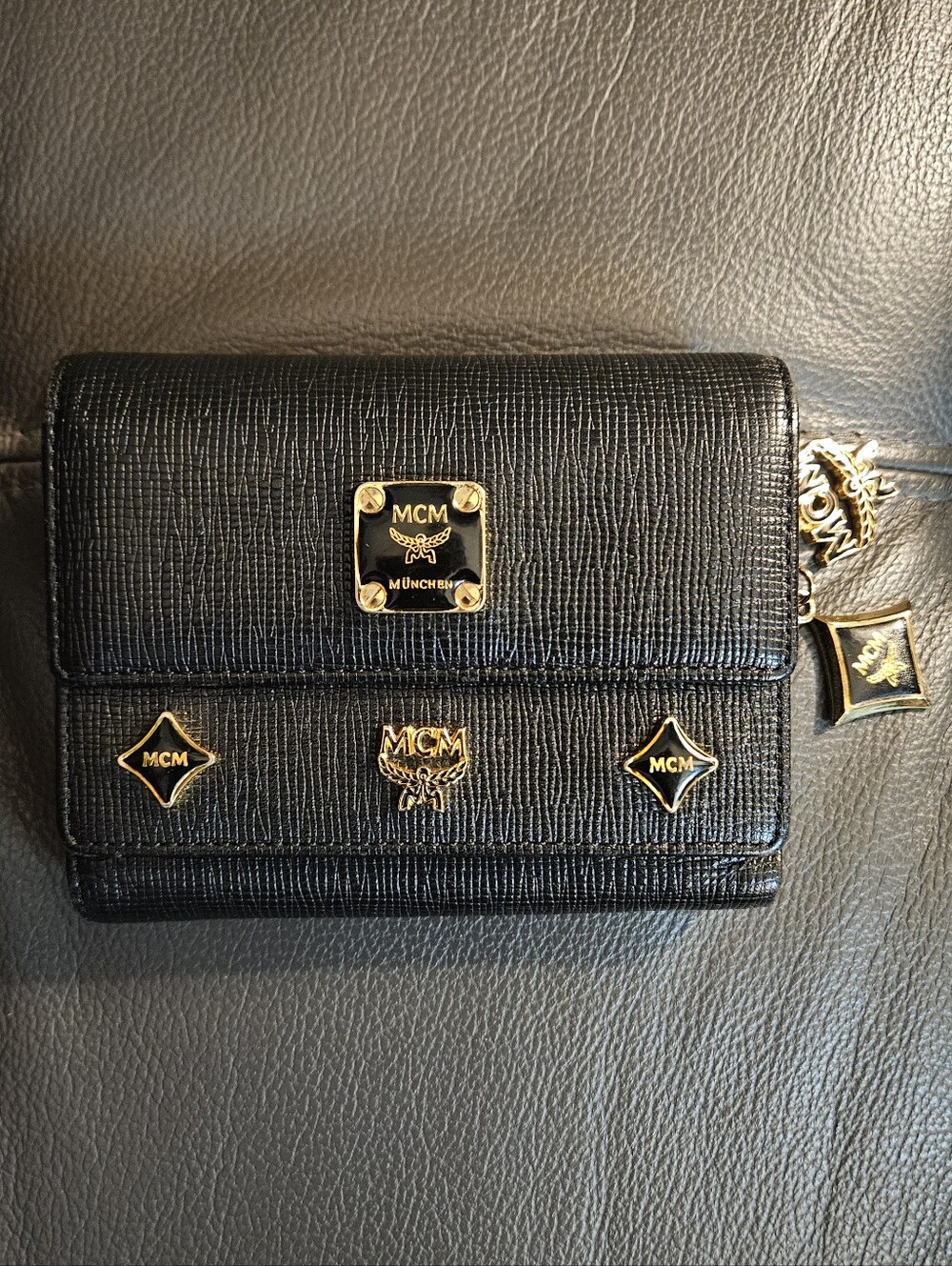MCM Black Leather Logo Plaque Trifold Wallet with Gold Hardware
